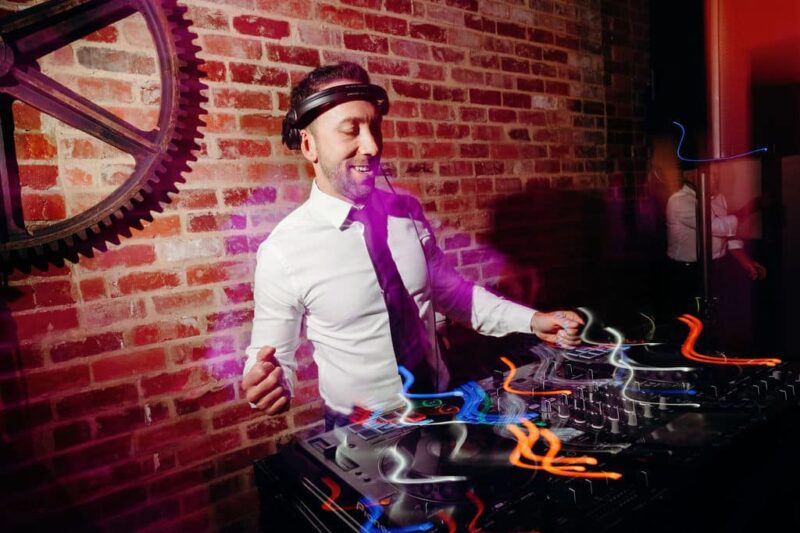 The Role of a DJ in Creating a Professional Yet Fun Atmosphere